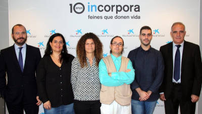 Foto de família del programa 'Incorpora' de l'Obra Social 'la Caixa' en un acte a Tarragona. Foto: ACN