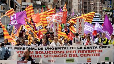 Pancarta de los trabajadores del Hospital de Jesús, en la manifestación de los sindicatos en Tortosa. foto: Joan REvillas