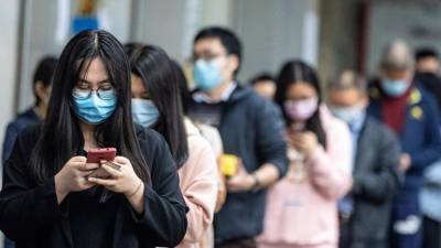 Imagen de personas llevando máscara debido al coronavirus. FOTO: EFE