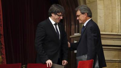 El president de la Generalitat Carles Puigdemont y el expresident Artur Mas