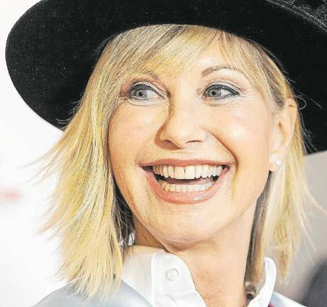 Olivia Newton-John, radiante y sonriente como era habitual verla, en una imagen de 2018. Foto: pockett/efe