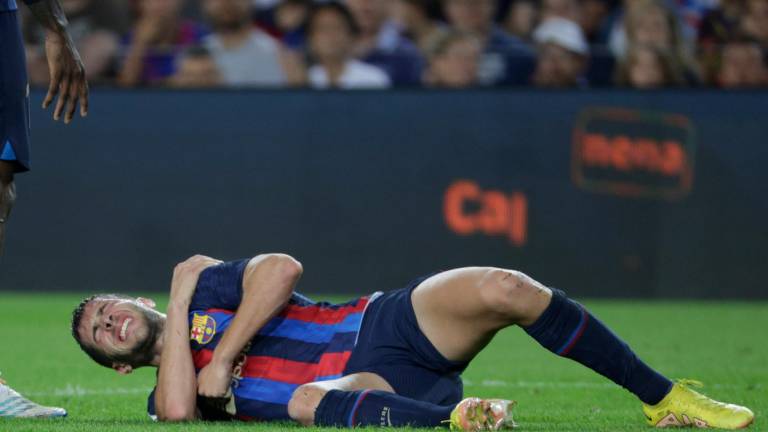 Sergi Roberto se duele en el suelo en el partido ante el Athletic Club.