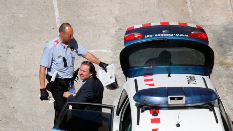 El exalcalde de Torredembarra, Daniel Masagué, en su traslado a prisión en junio del 2014. Foto: Lluís Milián / DT