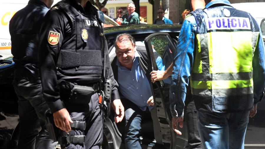 El presidente del Huesca, Agust&iacute;n Lasaosa, tras ser detenido por la Polic&iacute;a Nacional. EFE