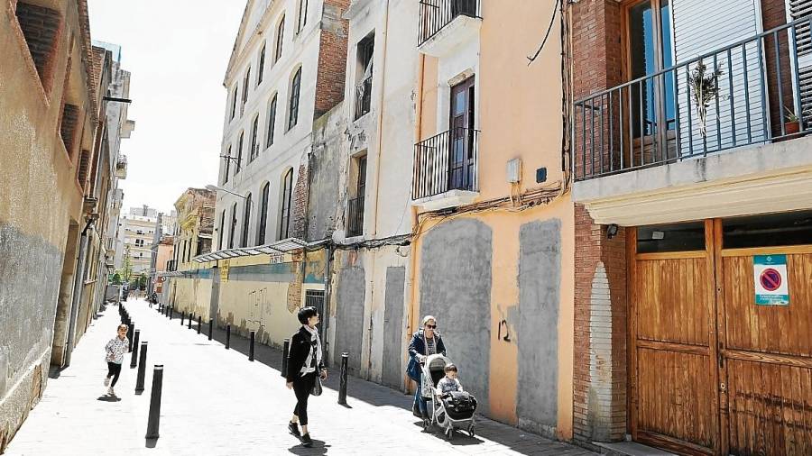 Imagen de la casa tapiada recientemente en la calle Gornals del barrio del Carme. FOTO: Alba Mariné