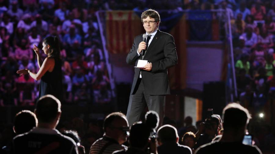 Puigdemont durant la seva intervenció a la Tarraco Arena. Foto: Pere Ferré
