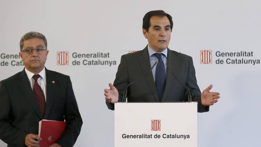 El secretario de Estado de Seguridad, José Antonio Nieto (d) junto al delegado del Gobierno en Cataluña, Enric Millo (i). Foto: Efe