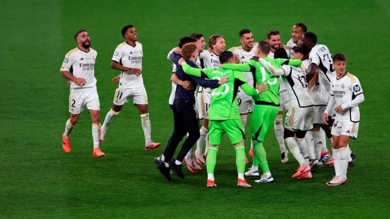 Los jugadores del Real Madrid celebrando el título. FOTO. EFE